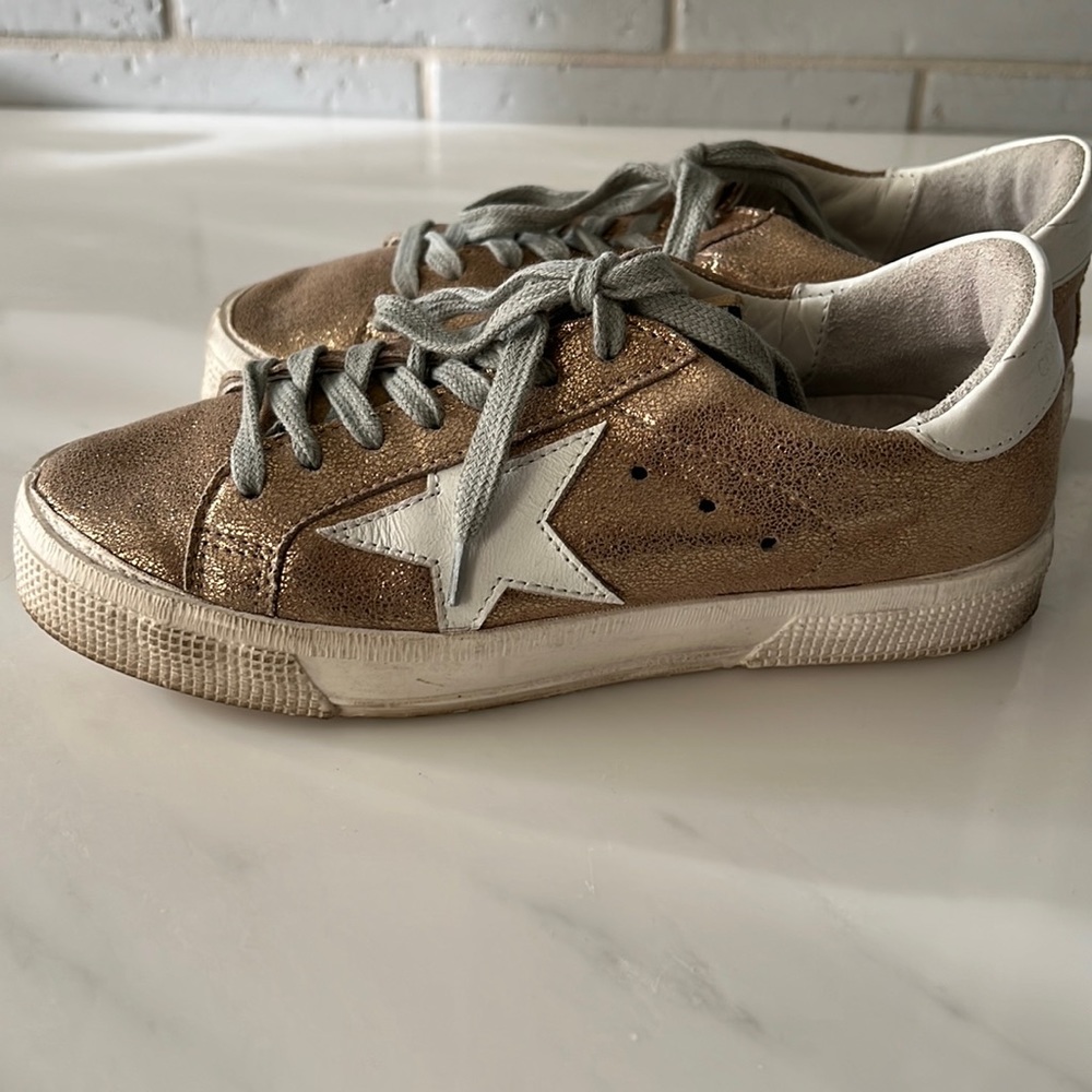 Golden Goose Deluxe Brand gold sneakers size 35.
